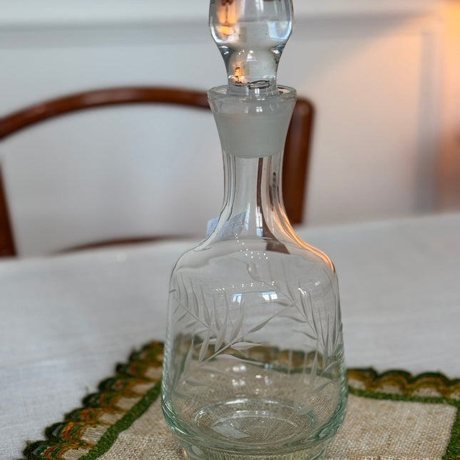 Finely cut, clear glass carafe