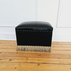 Pouf vintage noir en cuir