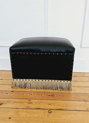Pouf vintage noir en cuir