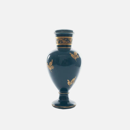 Petit vase bleu et or en porcelaine avec élégants motifs floraux