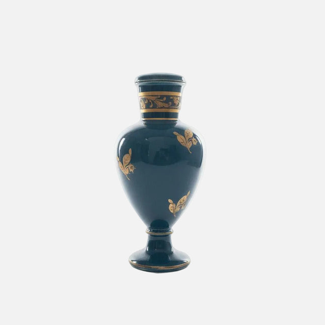 Petit vase bleu et or en porcelaine avec élégants motifs floraux